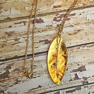 1980s gold leaf pendant on twist chain 20"